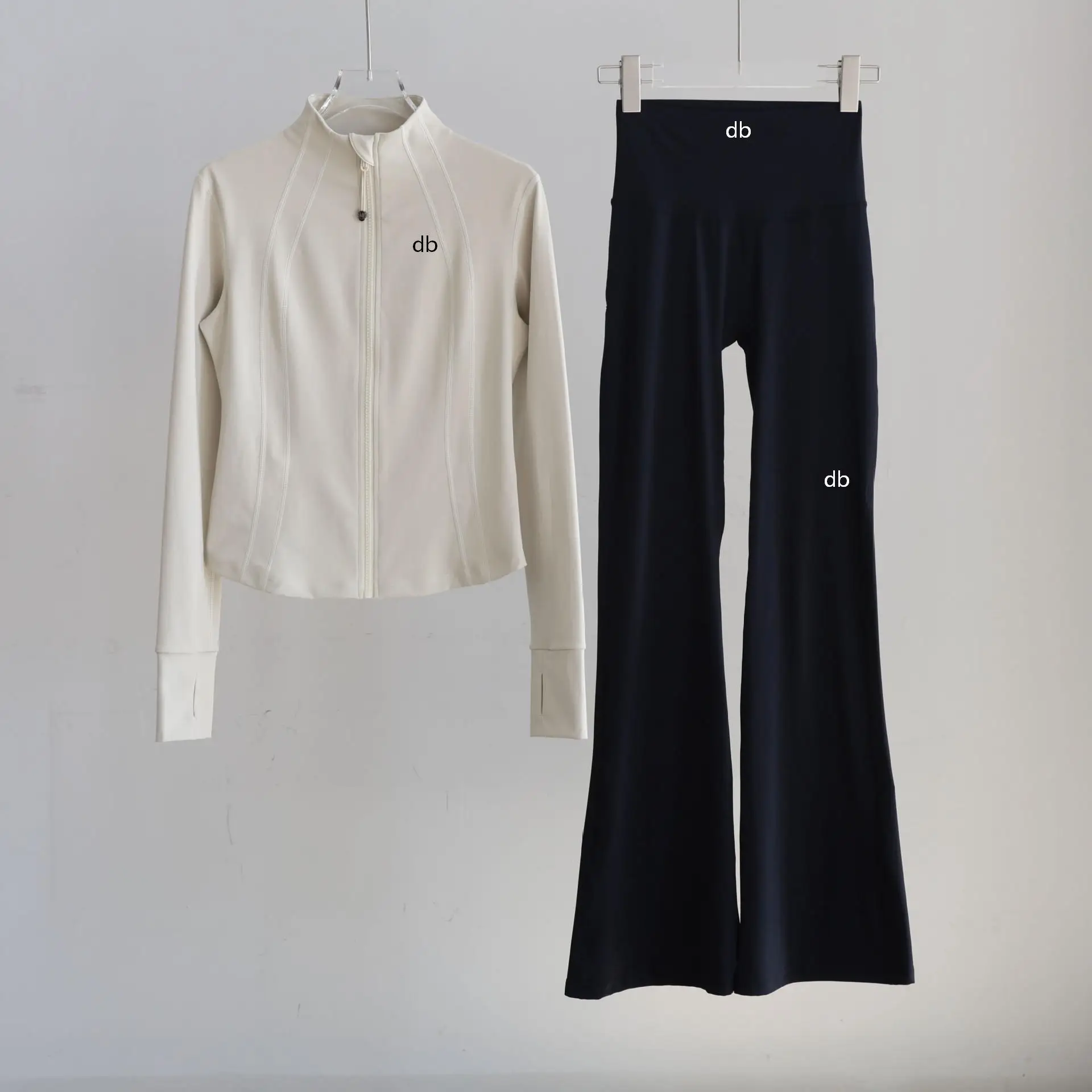 Ladies' Sports Suit with Fashionable and Trendy Slim Fit Stand Collar Design…